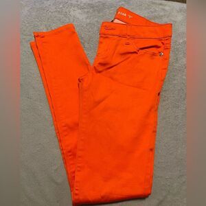Celebrity Pink juniors neon orange skinny jeans. Size 7